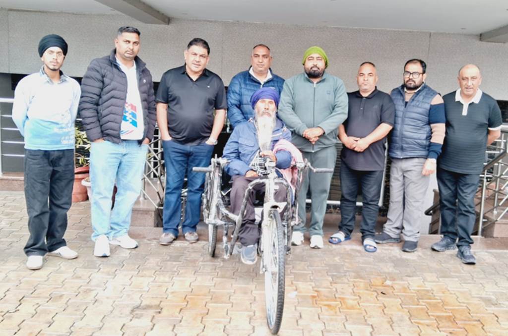 Raju Brothers Welfare Society donates wheelchair to a needy person in village Kitna
